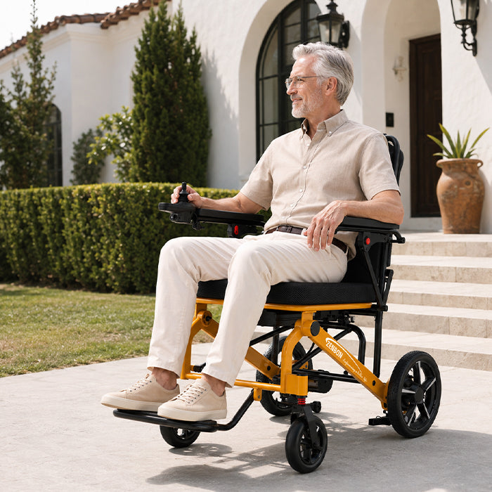 Adult woman using the ZENBON Flex Travel electric wheelchair indoors at home