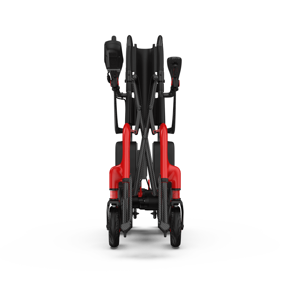 Folded ZENBON AeroLite electric wheelchair showing the dual X-frame design