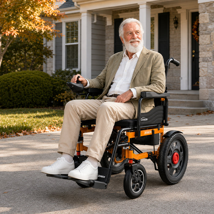 Older man riding the ZENBON Titan Pro electric wheelchair outdoors